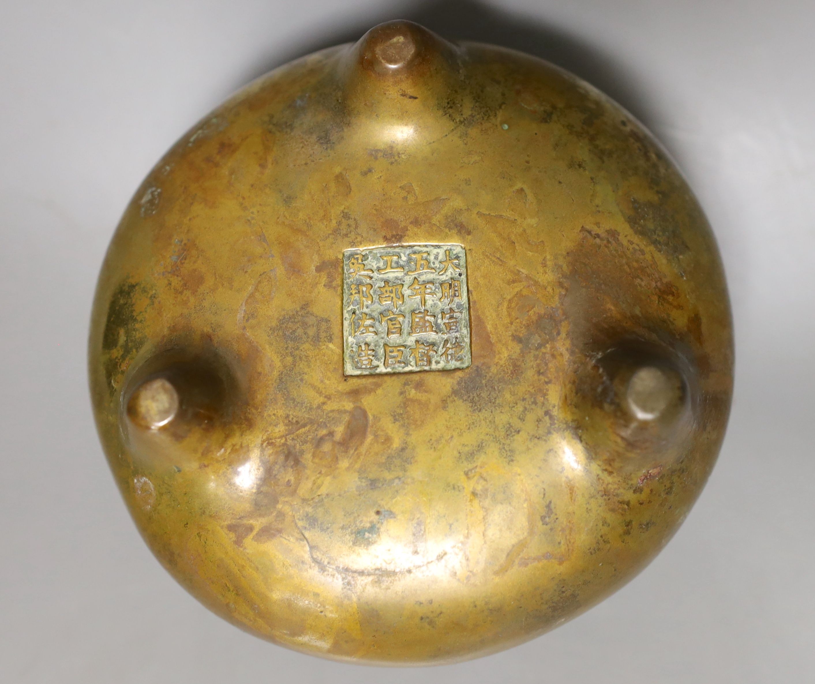 A Chinese bronze ding censer, Xuande mark but later, diameter 14cm
